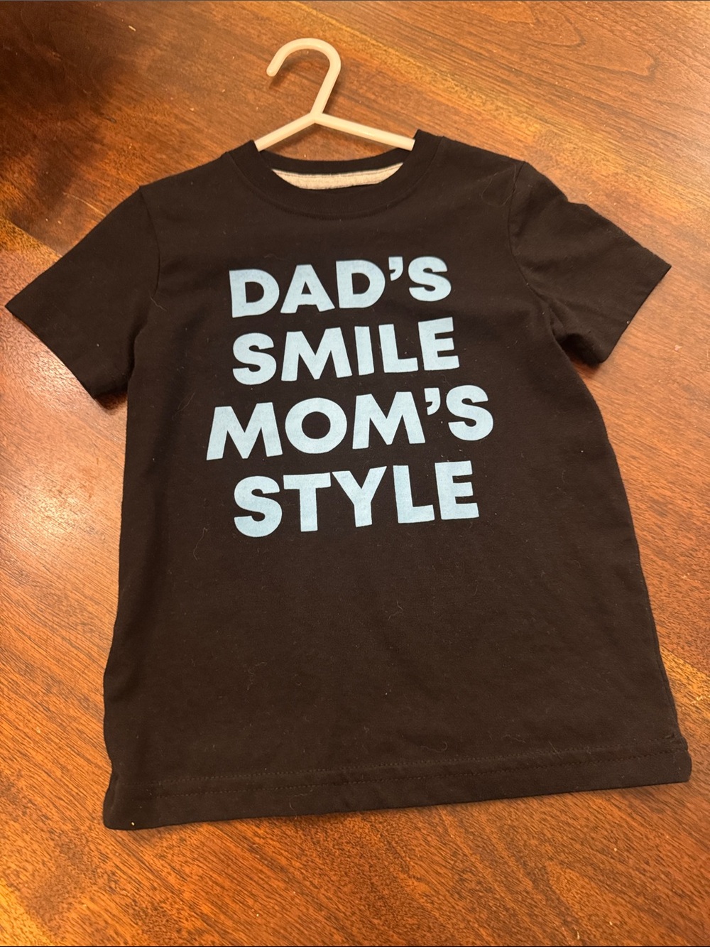 okie dokie Black Tee with Light Blue Graphic 'Dad's Smile Mom's Style'